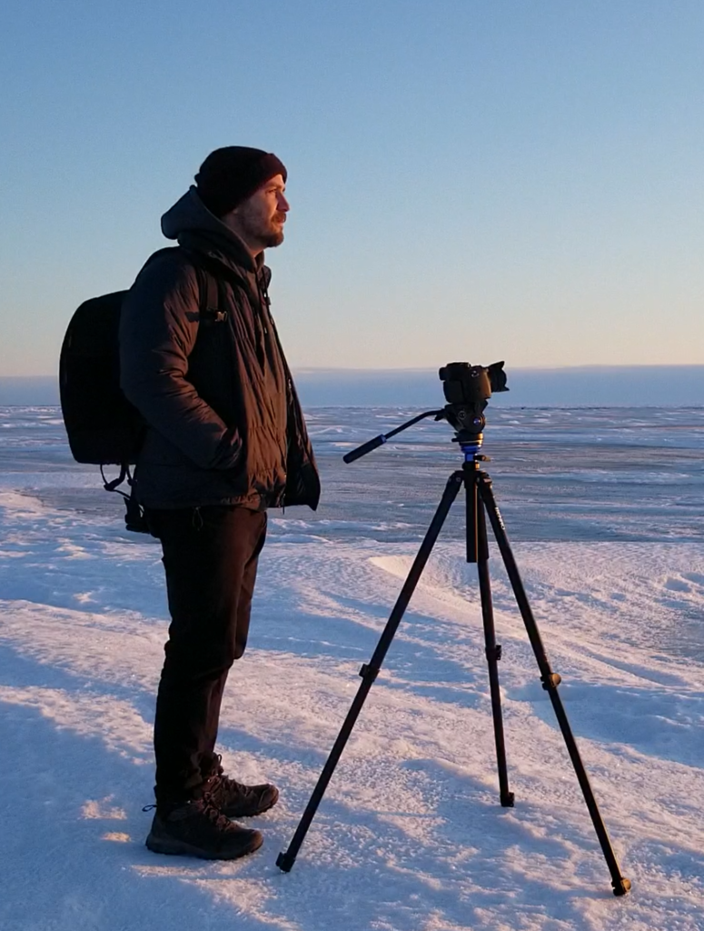 Karsten Wall outside shooting video in the winter
